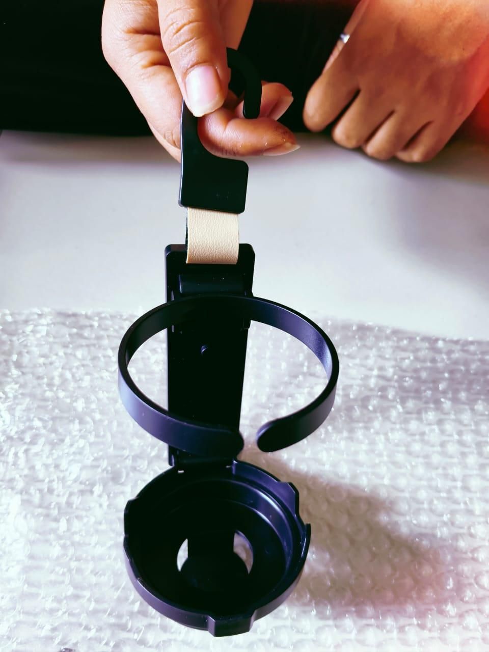 Premium Car Multifunctional Hook – Seat Headrest Organizer with Bottle Holder & Phone Stand Full Description: