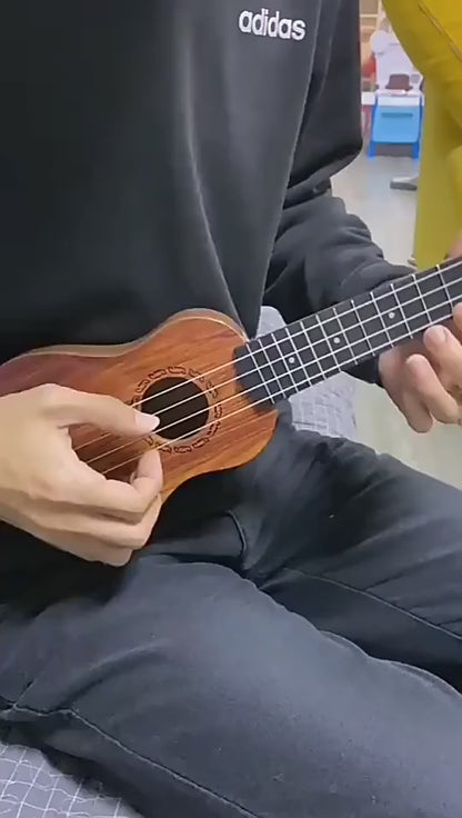 Mini Wooden Finish Plastic Guitar Music Instrument with 4 Strings – Kids Musical Learning Toy